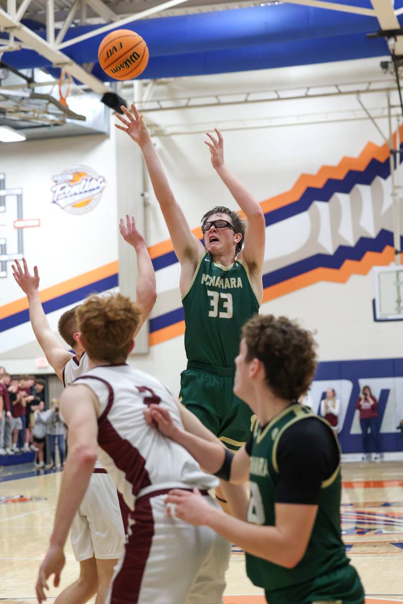 Bishop McNamara's Callaghan O'Connor puts up a shot during the Fightin' Irish's 77-70 loss to Tolono Unity in the IHSA Class 2A Pontiac Supersectional on Monday, March 9, 2026.