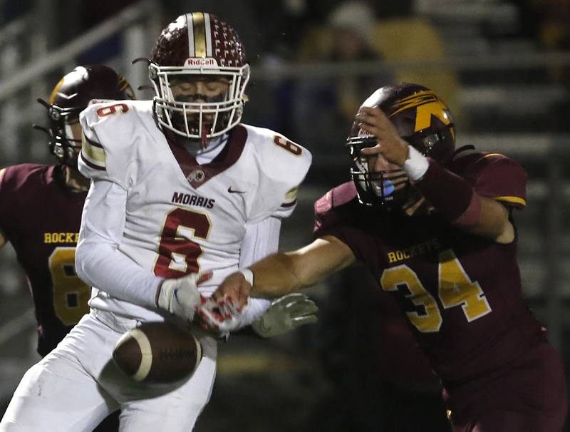 Richmond-Burton's Toby Quentrall-Quezada, right, knocks the football away from Morris' Gage Phillips during a Kishwaukee River Conference / Interstate 8 Conference crossover football game Friday, Sept. 30, 2022, between Richmond-Burton and Morris at Richmond-Burton Community High School in Richmond.