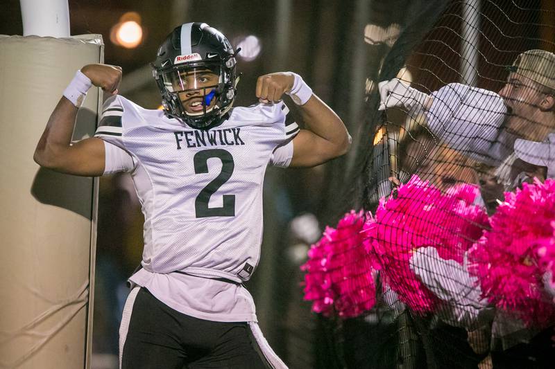 Fenwick quarterback Kaden Cobb (2) celebrates his touchdown run during the third quarter of the football game at Saint Ignatius College Prep on Friday, Oct. 22, 2021.The Friars won, 28-20.