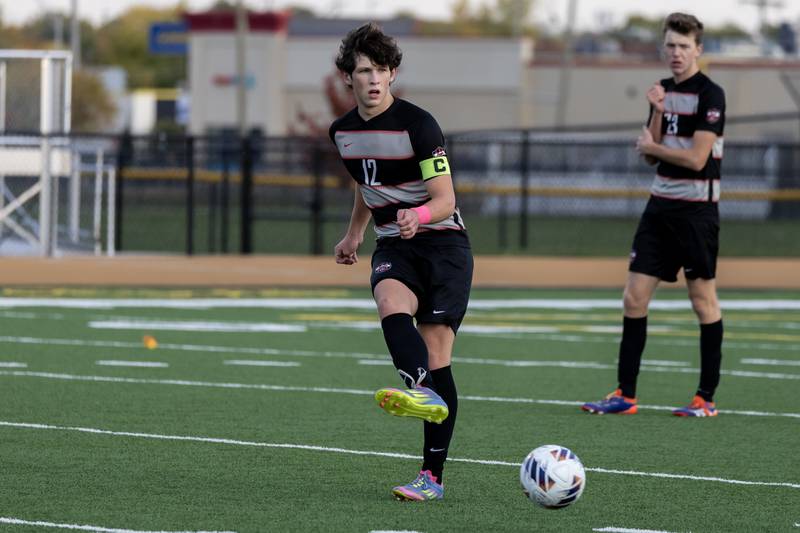 Lincoln-Way Central's Aidan Byrne passes to a teammate during the 3A Joliet West Sectional boys varsity soccer match against Lincoln-Way East at Joliet West on Oct. 29, 2025.