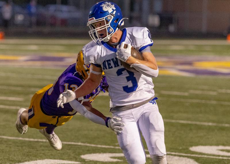 George Jungerman of Newman Central Catholic High School breaks a tackle from a Mendota player to score a running touchdown during the game at The Jeff Prusator Athletic Complex on September 5, 2025 at Mendota High School.