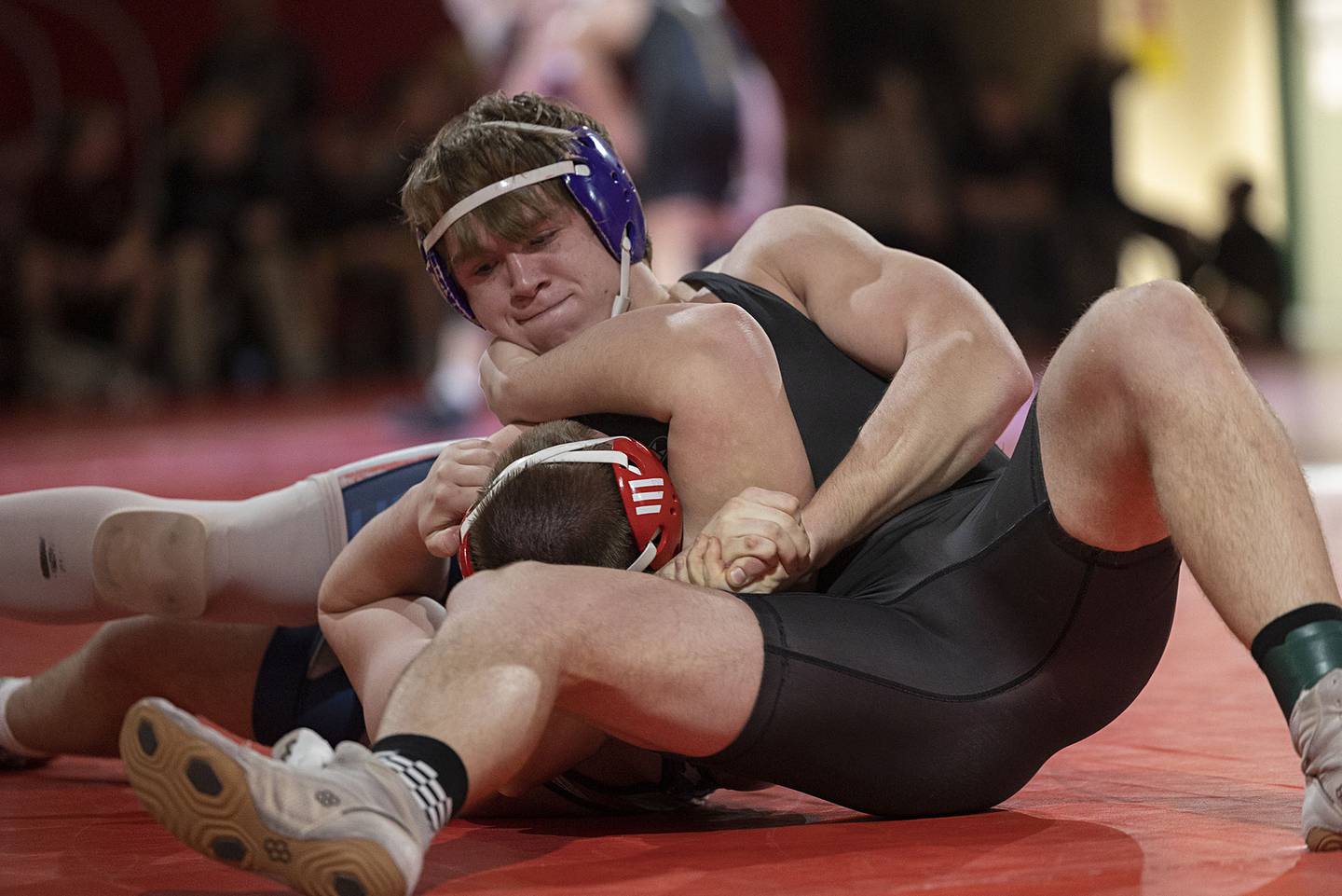 Dixon’s Dawson Kemp pins Morrison’s Caleb Carroll in the 215 pound weight class in the Class 1A wrestling sectionals at Oregon.