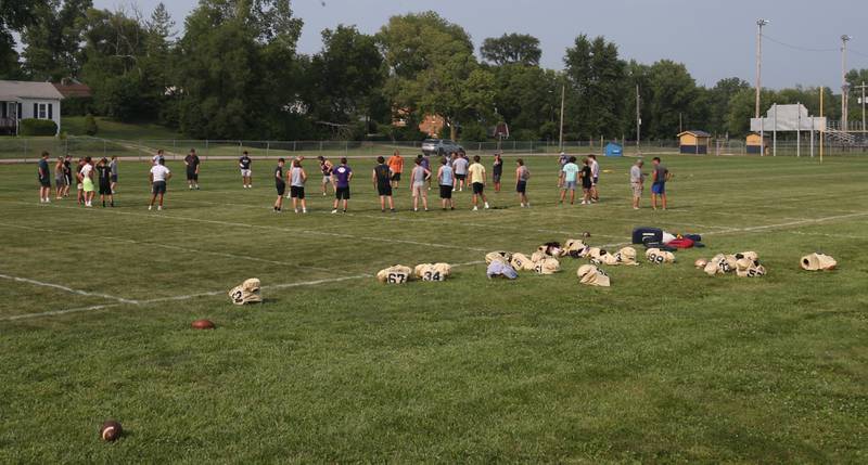 Members of the Marquette football team practice during football camp on Monday, July 24, 2023 on the practice field next to Gould Stadium in Ottawa.