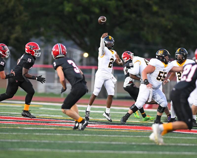 Joliet West's Landon Mars (2) throws for a pass during the game while taking on Yorkville on Friday Sept. 5, 2025, held at Yorkville High School.