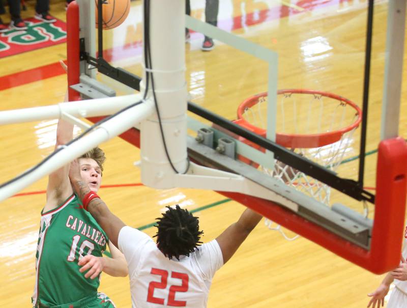 L-P's Braylin Bond lets go of a shot over Streator's Tristin Finley during the Class 3A Regional title game on Friday, Feb. 28, 2025 in Sellett Gymnasium at L-P High School.