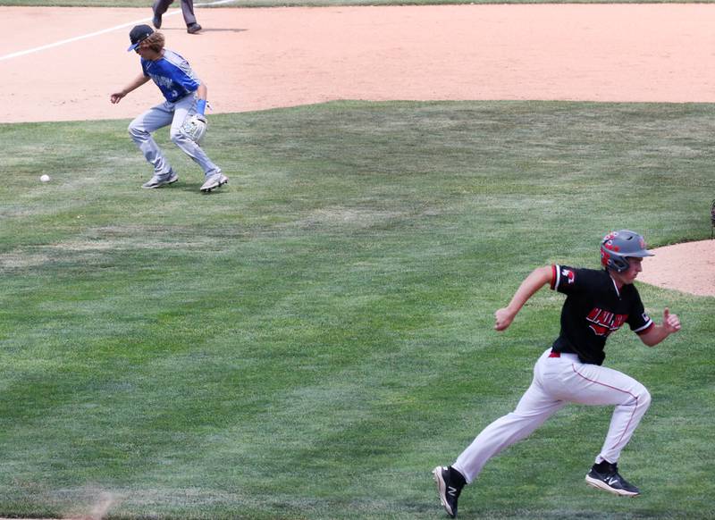 Newman's third baseman Garret Wolfe draws an error while attempting to throw out Henry-Senachwine's Mason Johnson at first base during the Class 1A State semifinal game on Friday, June 2, 2023 at Dozer Park in Peoria.