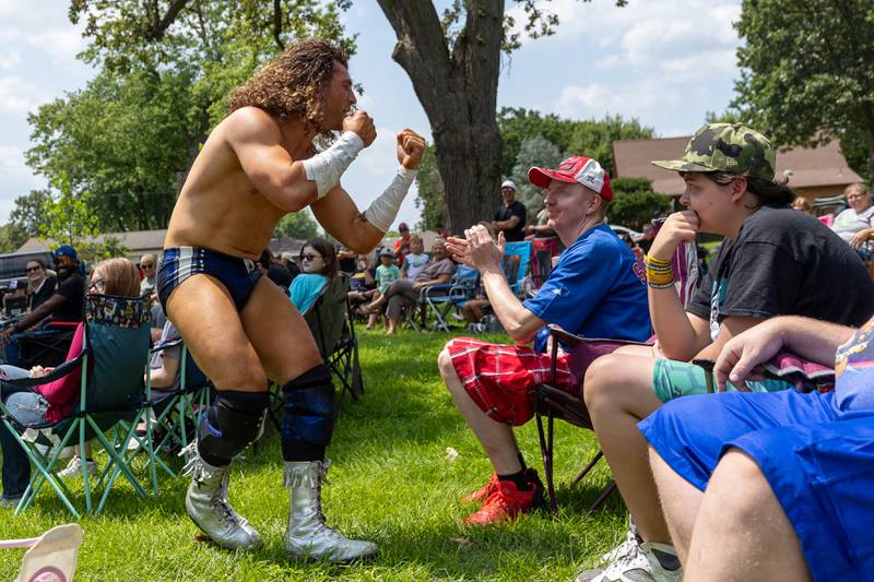 Channing Thomas taunts audience member at the Taste of the Illinois Valley DreamWave Wrestling event on Saturday, August 2, 2025 at Centennial Park in Peru.
