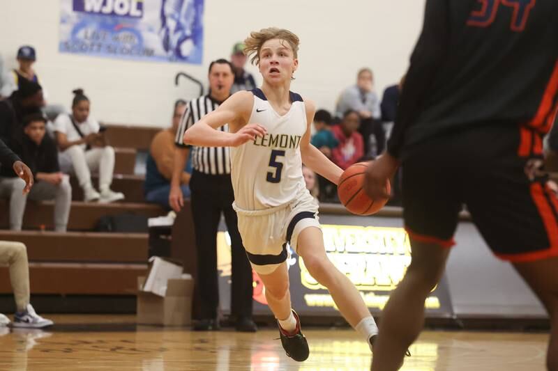 Lemont’s Rokas Castillo drives to the basket against Romeoville in the WJOL Thanksgiving Classic Championship in Joliet on Saturday.