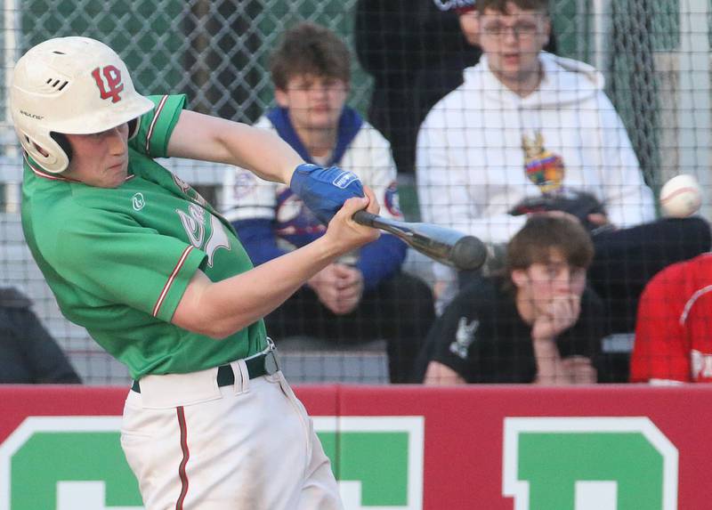 L-P's Jacob Gross smacks a double against Ottawa at Huby Sarver Field inside the L-P Athletic Complex on Tuesday, April 23, 2024 in La Salle.