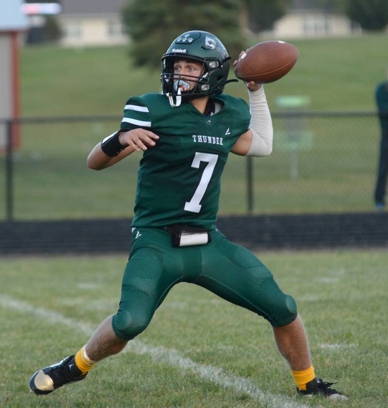 West Carroll's Winter Harrington (7) drops back to pass in 8-man football action against Polo in Mt. Carroll on Friday, Sept. 12, 2025.
