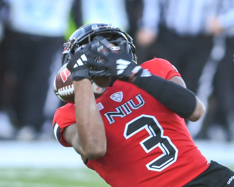 Northern Illinois Huskie Trayvon Rudolph catches the ball for a first down during the game on Saturday Nov. 30, 2024, while taking on Central Michigan.