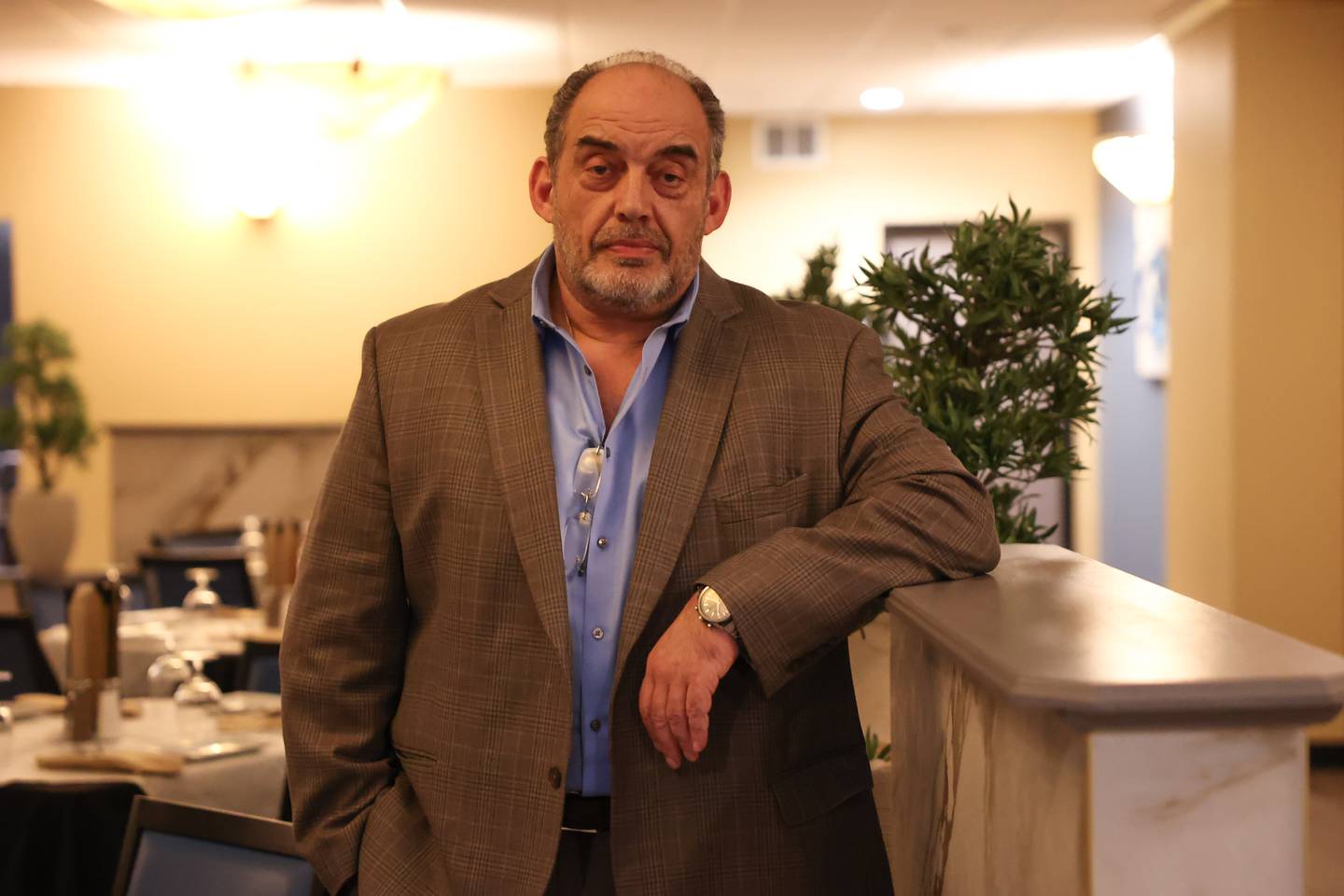 Bill Dimitroulas, president of the Arkas Restaurant Group, poses at Cut 158 Chophouse, one of six Joliet area restaurants he owns.