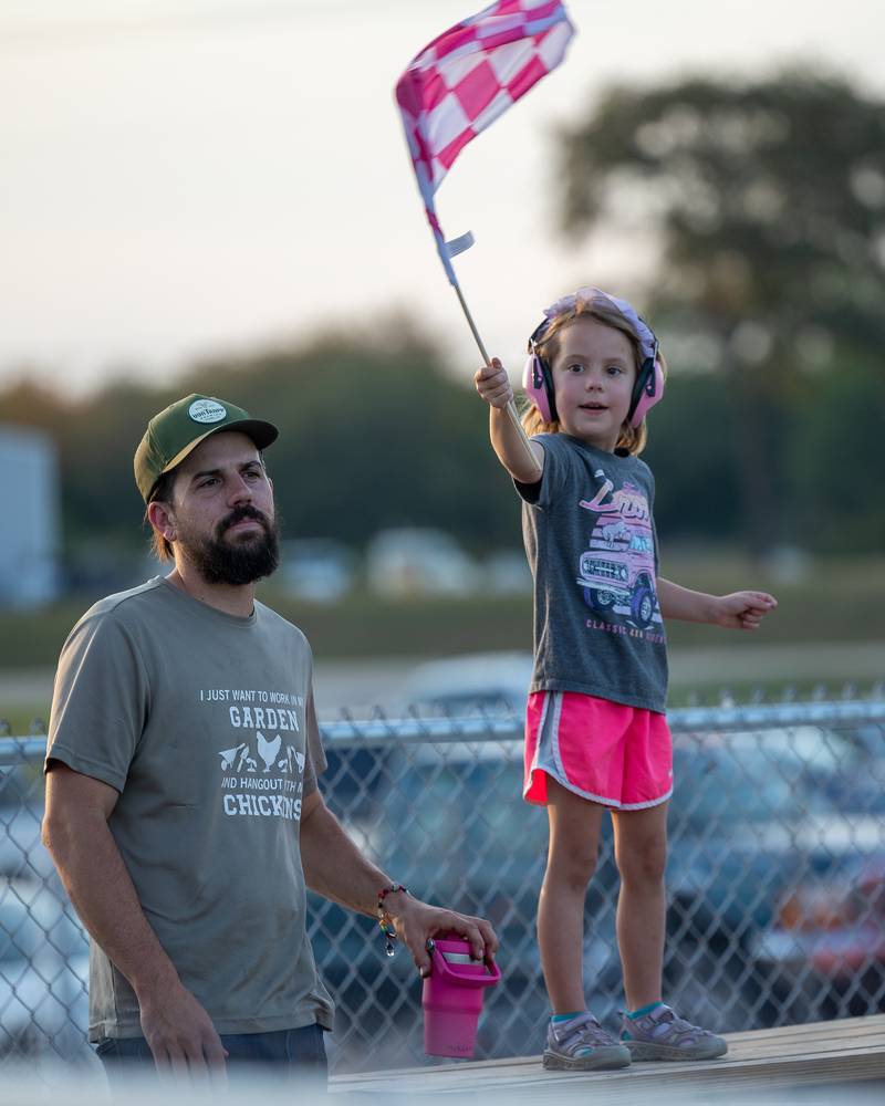 (from left) Adam Brkovic and daughter Morgan excitingly await start of the Monster Truck Bash show on Saturday, Sept. 13, 2025 at the La Salle Speedway in La Salle.