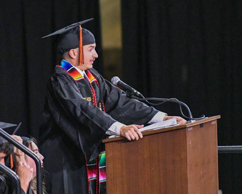 DeKalb High School senior Class President Michael Biundo gives a farewell speech to his peers on Saturday, May 24, 2025, during the Class of 2025 Commencement ceremony held at the NIU Convocation Center in DeKalb.