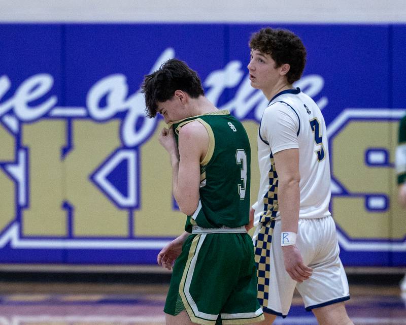 Marquette's Easton DeBernardi (3) walks next to Alec Tomsha (3) of St. Bede as he reacts during the Class 1A Regional Boys Basketball Championship game on Friday, Feb. 27, 2026 at Serena High School.