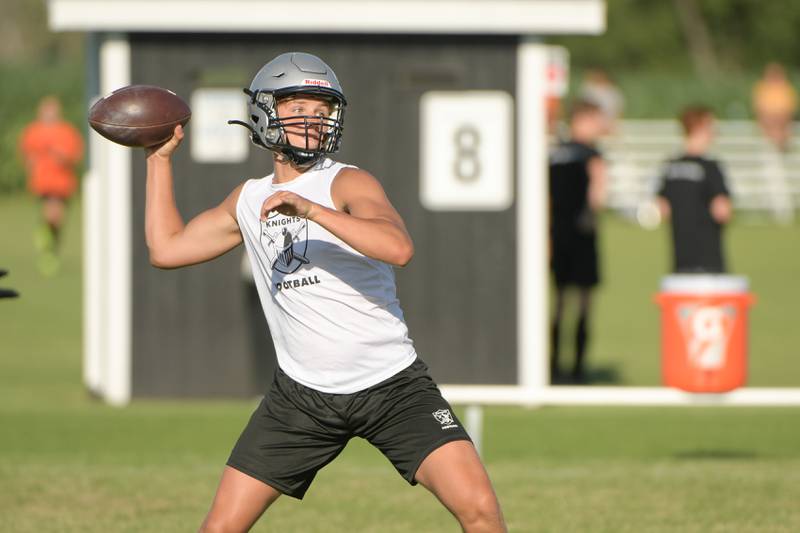 Kaneland’s quarterback Troyer Carlson pass during a 7 on 7 football against Oswego in Maple Park on Tuesday, July 12, 2022.