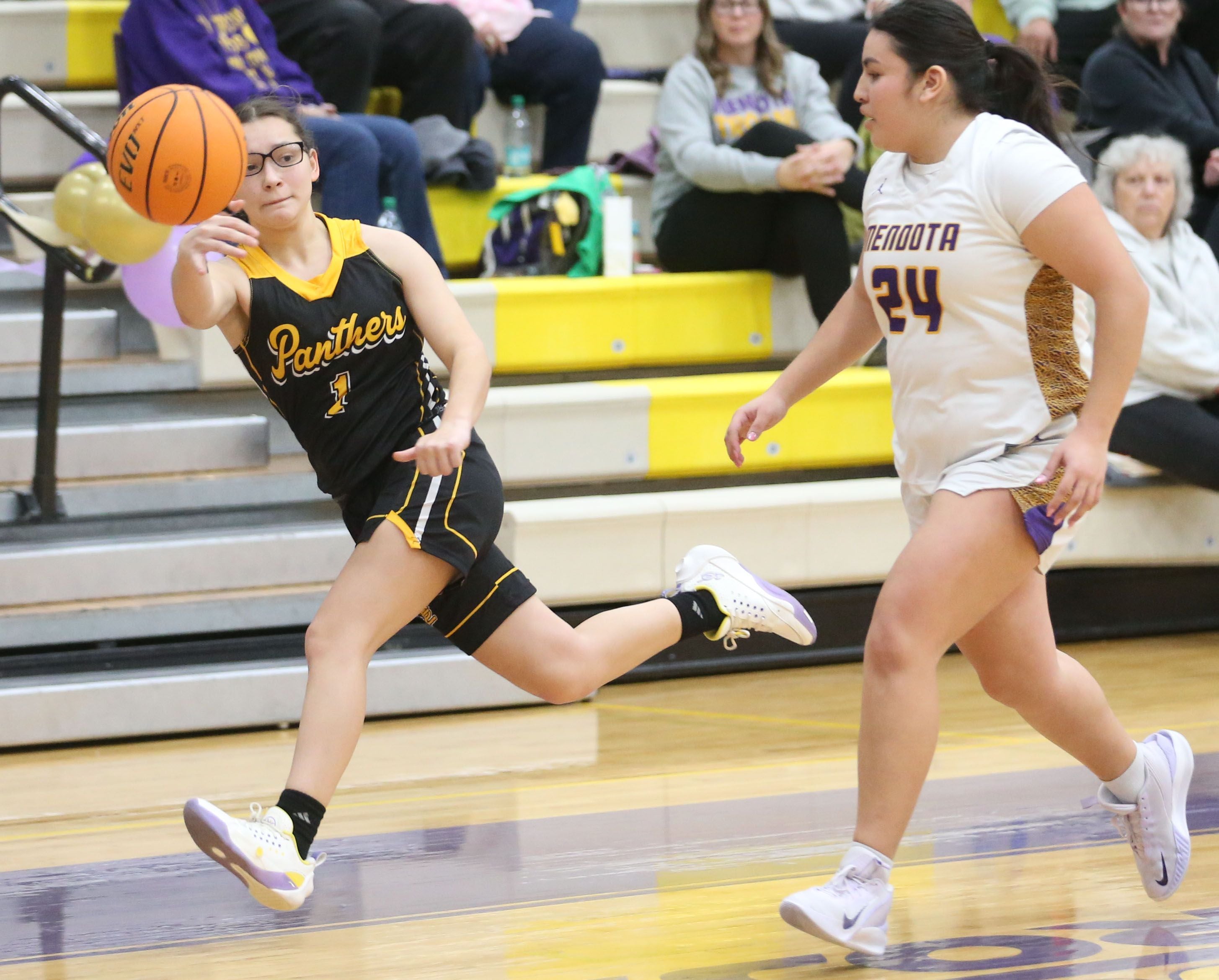 Putnam County's Isabella Gibson flings the ball out away from Mendota's Emily Diaz on Tuesday, Feb. 10, 2026 at Mendota High School.