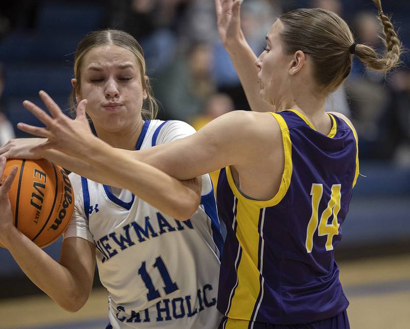 Newman’s Brooklyn Smith works against Mendota’s Laylie Denault Thursday, Jan. 23, 2025.