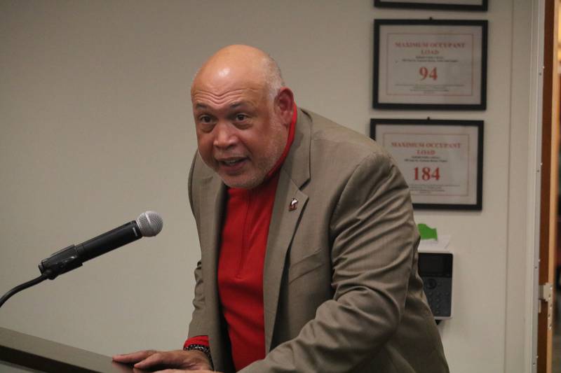 Vice President and Director of Athletics and Recreation Sean Frazier gives remarks on NIU's historic victory over Notre Dame during the DeKalb City Council's Sept. 9, 2024, meeting.