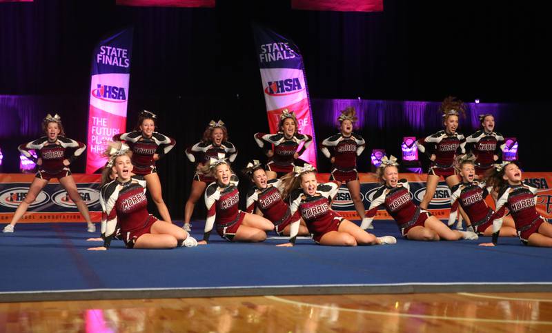 Members of the Morris cheerleading team perform at the Competitive Cheerleading State Final Competition on Saturday, Feb. 3, 2024 at Grossinger Motors Arena in Bloomington.