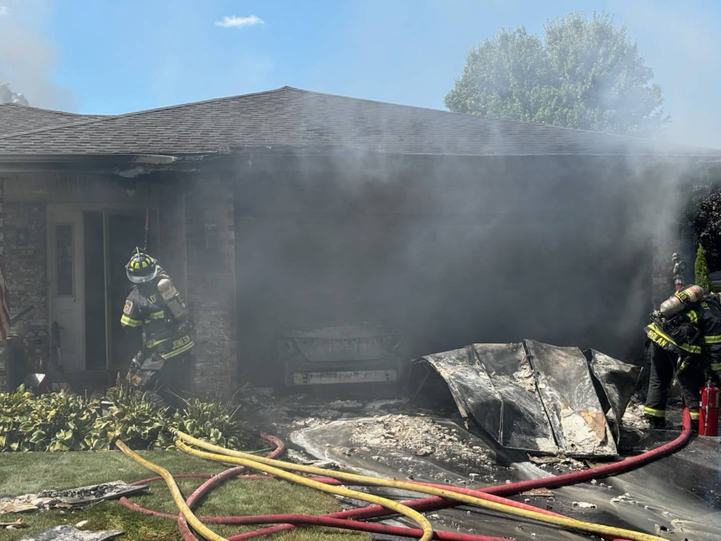 Smoke billows out of the garage of a home in the 500 block of Stephanie Drive in Lockport on Tuesday, September 2, 2025.