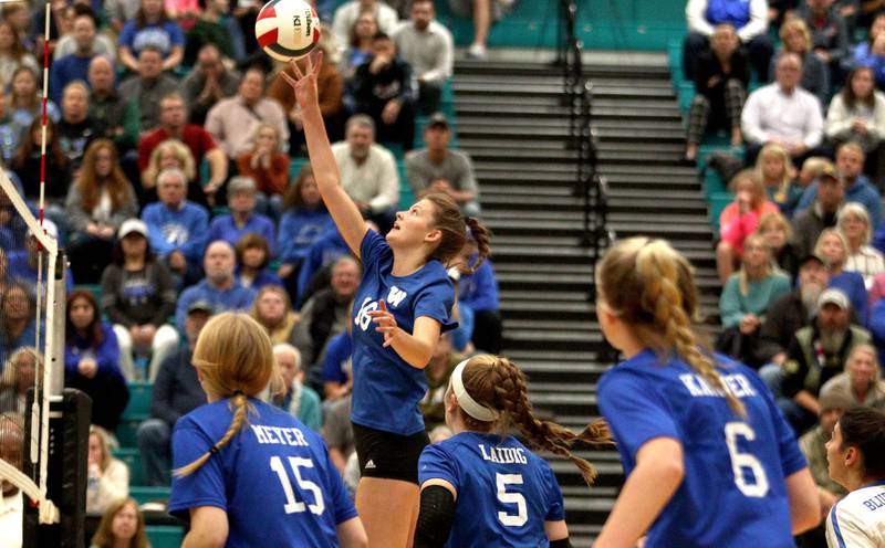 Woodstock’s Hallie Steponaitis hits the ball against Prairie Ridge in IHSA Class 3A sectional semifinal volleyball action at Woodstock North Monday.