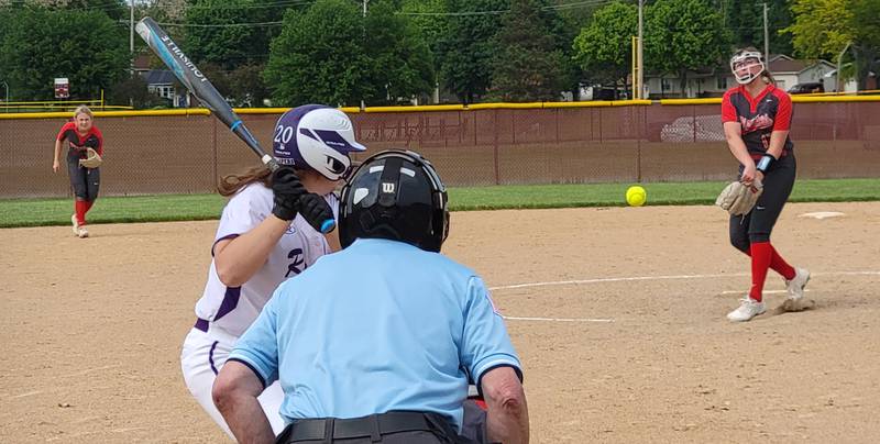 Ottawa pitcher Mckenzie Oslanzie (right) fires a pitch to a Plano batter during Tuesday's 3A Morris Regional opener on May 24, 2022.