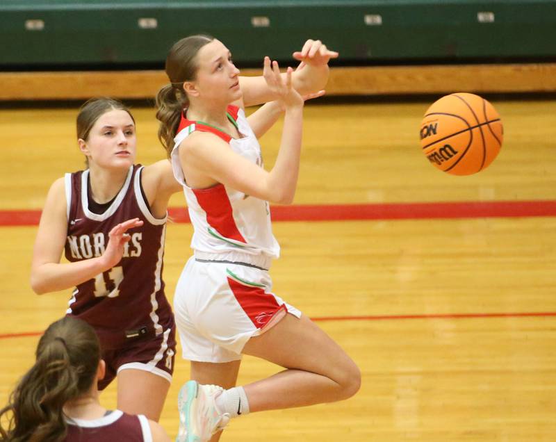 L-P's Alexus Hines is fouled by Morris's Alyssa Jepson under the hoop on Friday, Dec. 6, 2024 in Sellett Gymnasium at L-P High School.