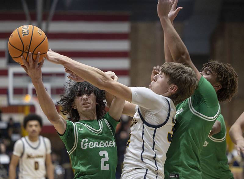 Sterling’s Jack Saathoff vies with Geneseo’s Dylan Haser for the ball Friday, Dec. 5, 2025.