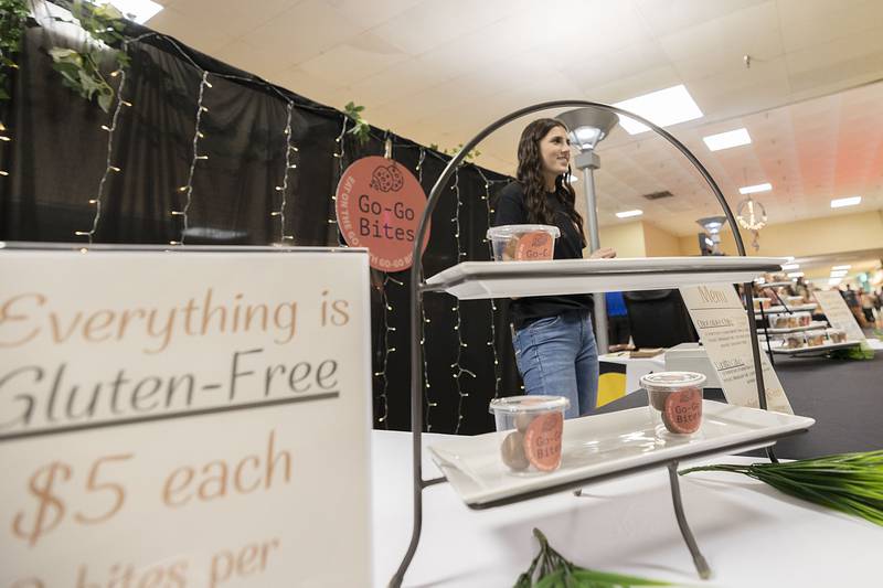 Sydney Hargrave of Dixon sells Go-Go Bites, a chocolate or vanilla treat at her CEO both on Wednesday, April 26, 2023.