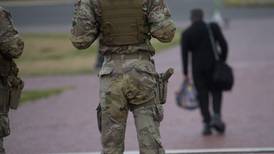 Some National Guard units in Washington are now carrying firearms in escalation of Trump deployment