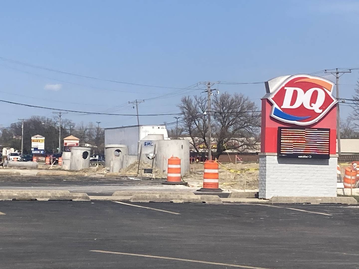 Construction has resumed on the Illinois Route 7 Channelization project in Lockport. Concrete pipes stand along the road outside Dairy Queen. 
April 14, 2025.