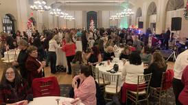 Martinis, Mistletoe bash in Joliet draws 400