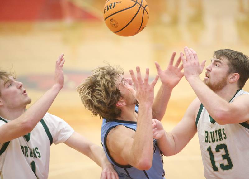 The ball gets away from Bureau Valley's Landon Hulsing as St. Bede defenders Kaden Newman and Mason Ross tip it away during the 50th annual Colmone Classic on Thursday, Dec. 12, 2024 at Hall High School.