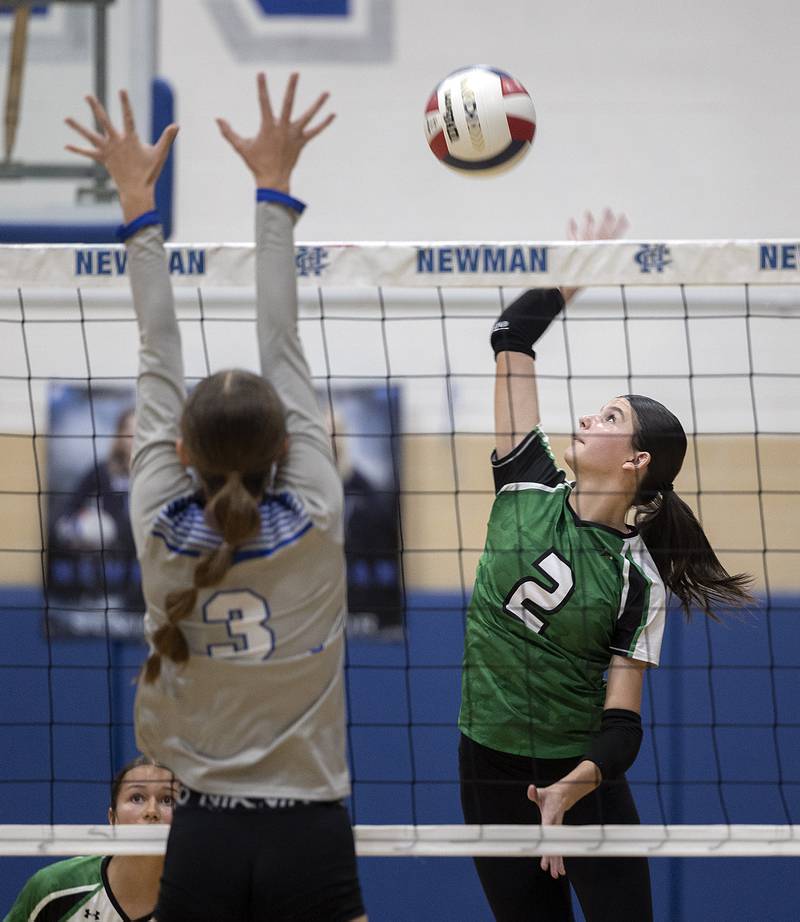 Rock Falls’ Kaltrina Lecaj goes up for a spike against Newman’s Lauren McClain Monday, Oct. 28, 2024, during regional play at Newman.