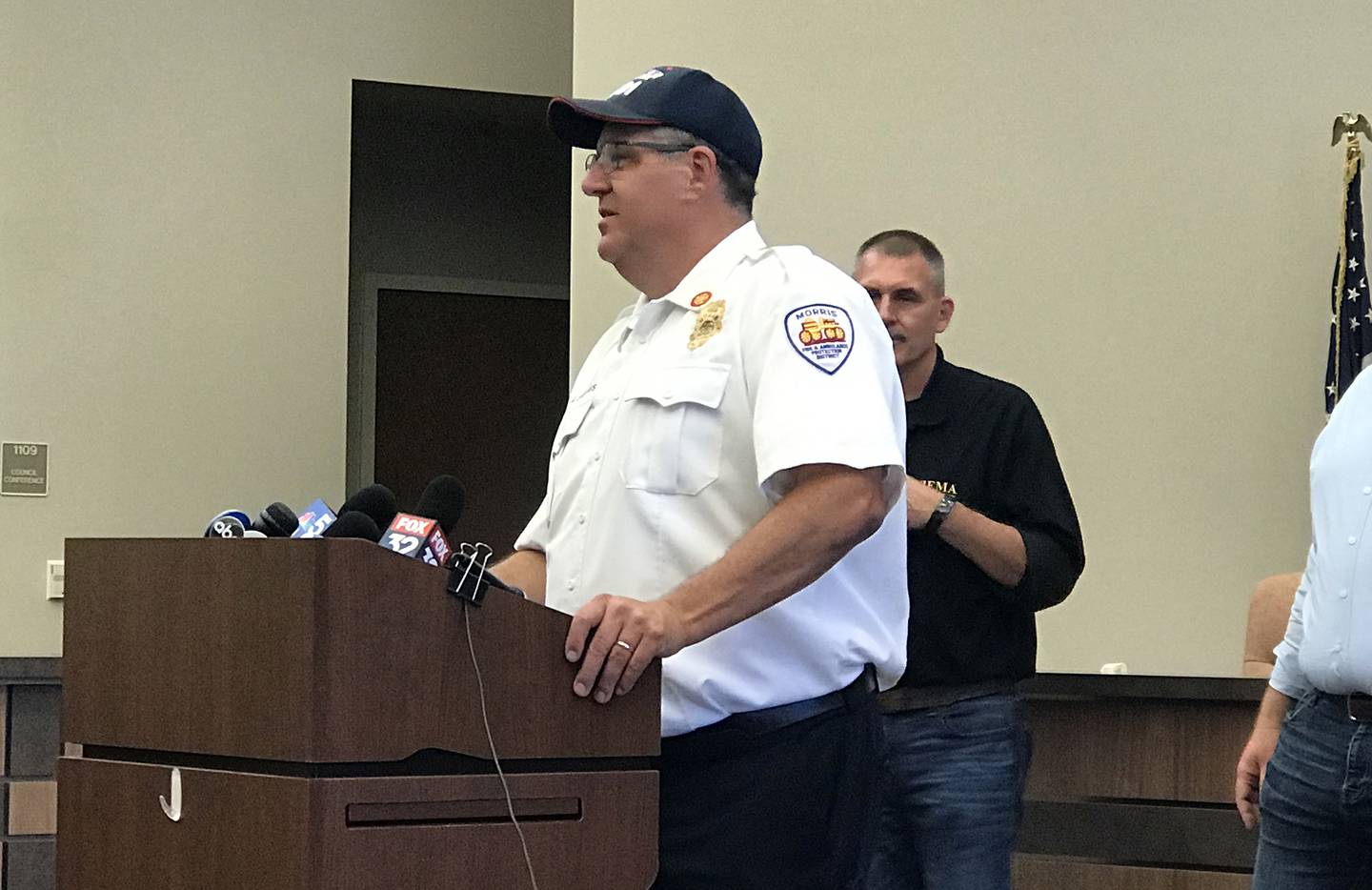 Morris Fire Protection & Ambulance District Chief Tracey Steffes addresses the media Thursday at a press conference regarding the industrial fire on the east side of Morris.