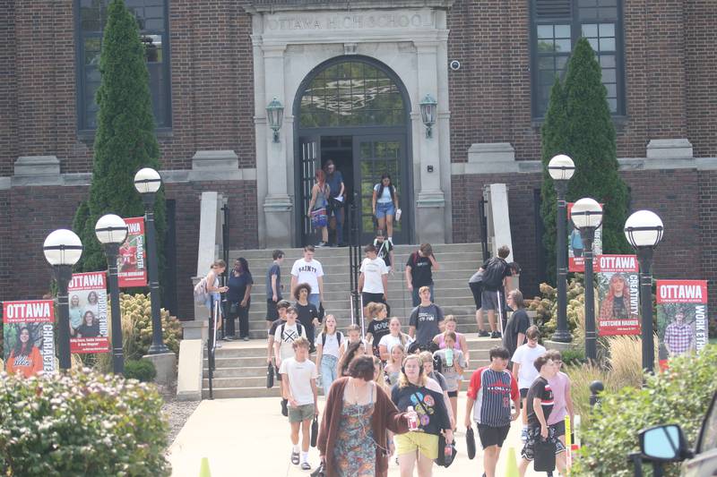 Students exit Ottawa High School on Tuesday, Aug. 27, 2024. The school released students at 12:10p.m. due to the extreme heat.