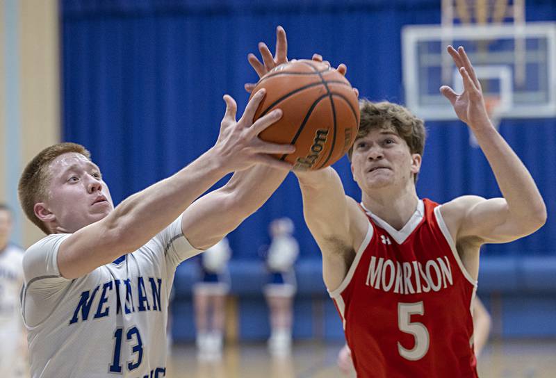 Newman’s George Jungerman fights for the ball against Morrison’s Chase Newman Wednesday, Jan. 3, 2024 at Newman High School.