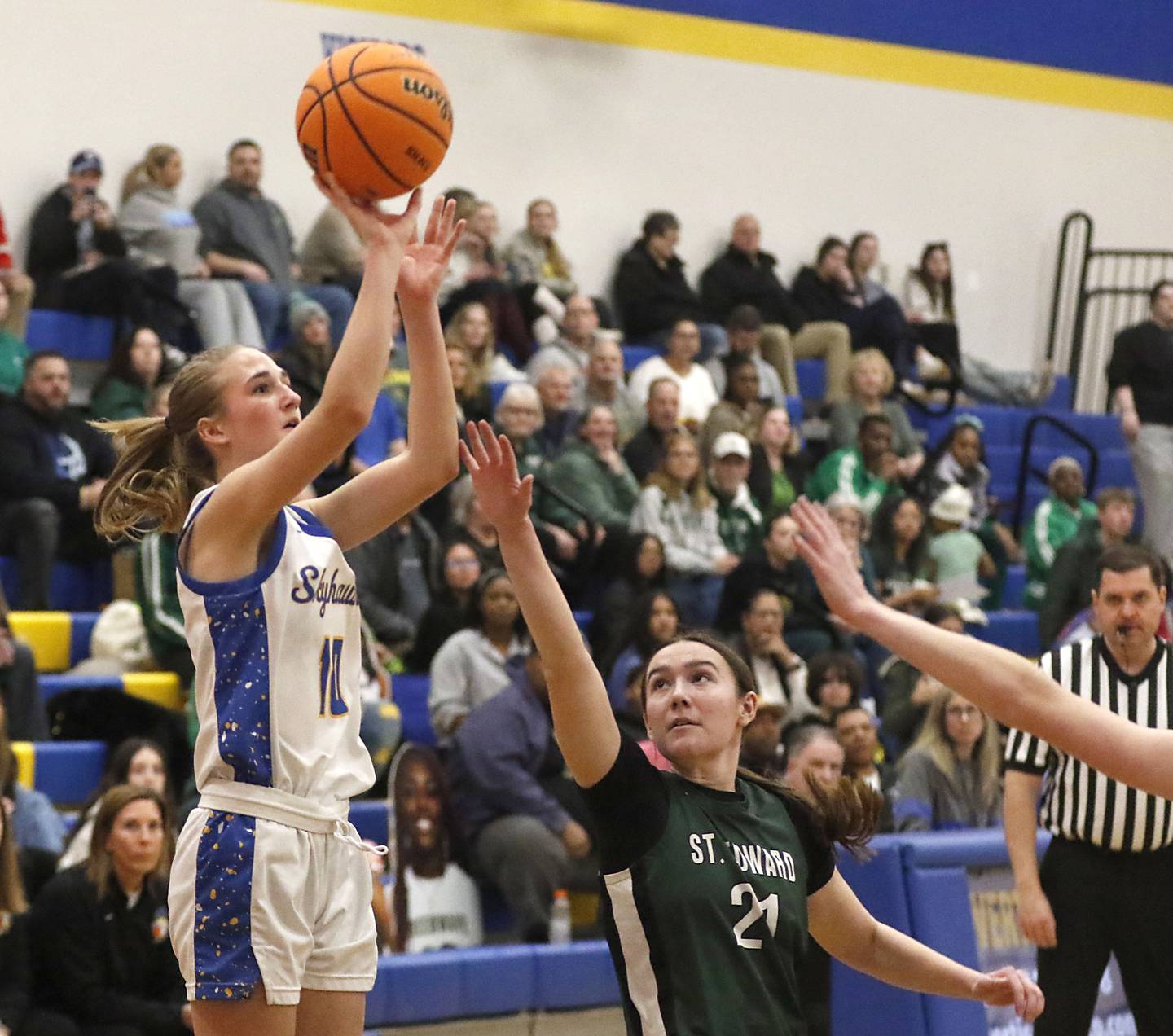 Johnsburg's Addison Sweetwood shoots the ball over St. Edward's Sarah Gurley during the IHSA Class 2A Johnsburg Sectional girls basketball championship game on Thursday, February, 26, 2026, at Johnsburg High School.