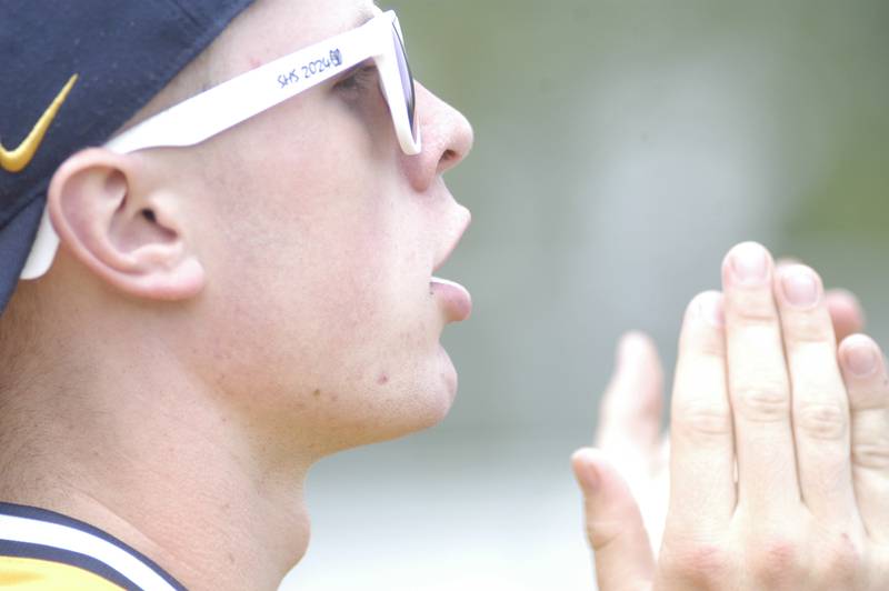 Sterling player Will Ports shouts encouragement to his team. Dixon defeated Sterling 10-2 to win the Freeport regional in Freeport on May 31st, 2025.