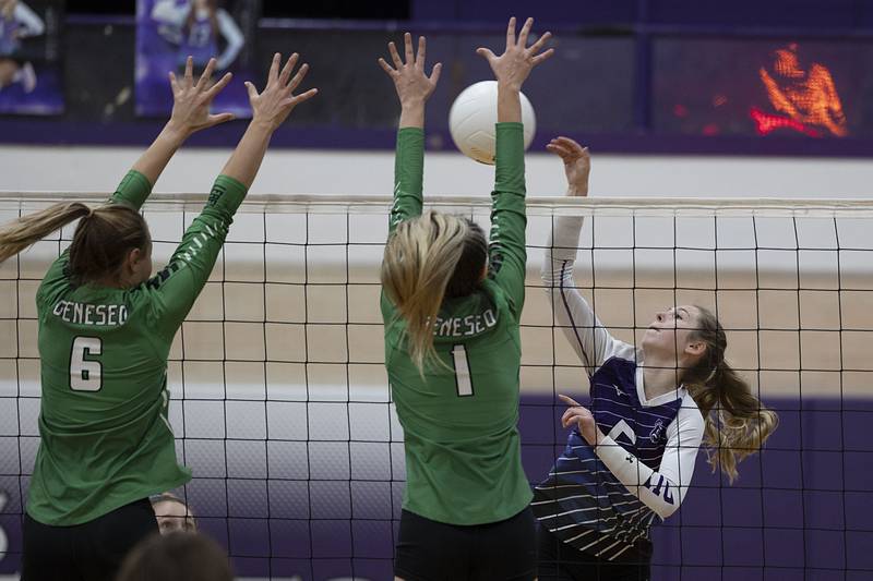 Dixon’s Morgan Hargrave spikes the ball Monday, Oct. 17, 2022 against Geneseo.