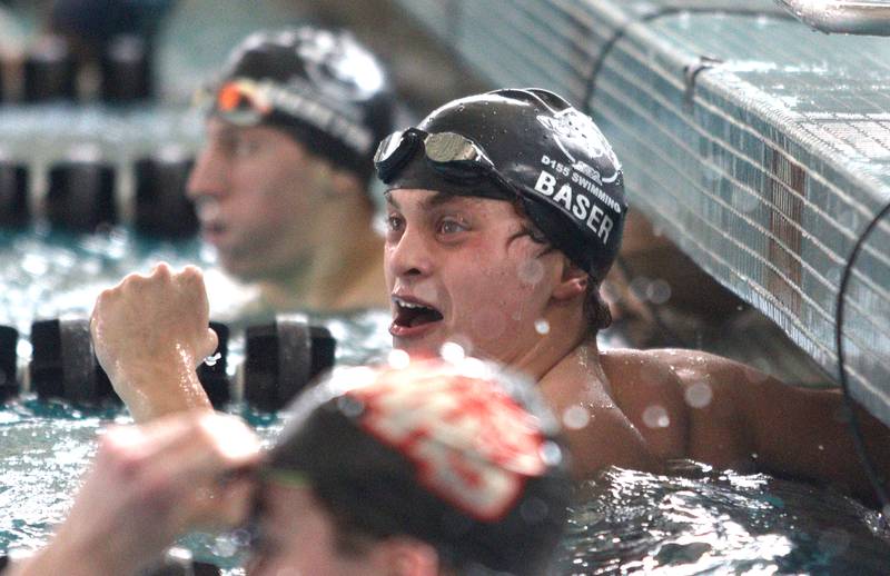 Brendan Baser of Cary-Grove co-op celebrates after the 200-Yard Freestyle during the Fox Valley Conference Swimming Championships at Woodstock North High School Saturday.