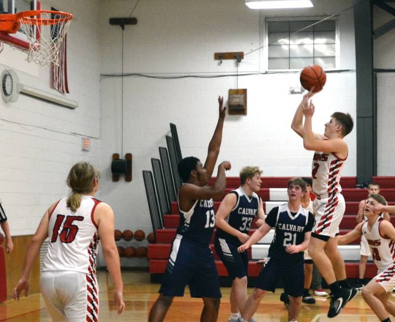 LaMoille's Brayden Klein rises for a shot over Calvary Christian on Wednesday in the LaMoille Holiday Classic. The Lions won 50-47.