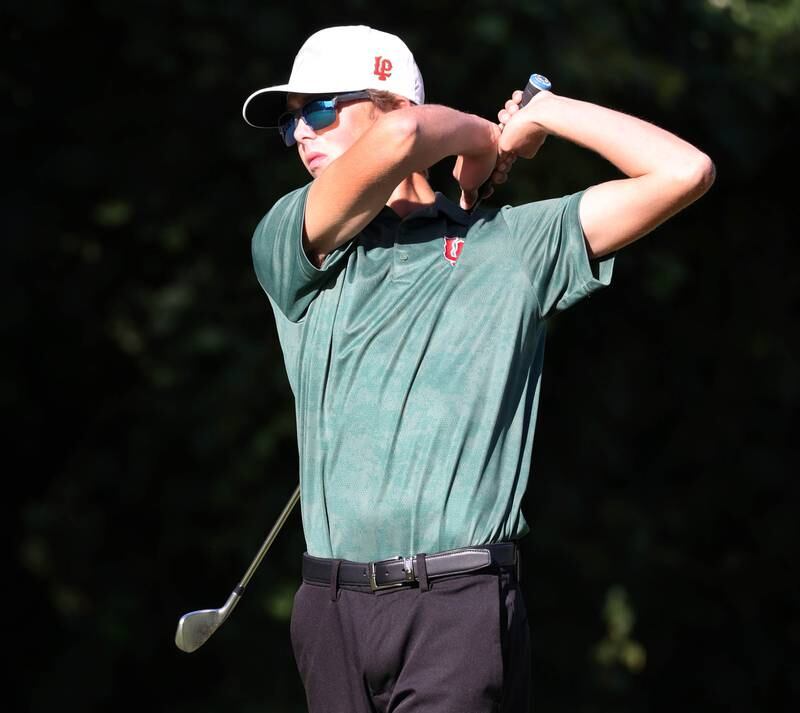 LaSalle-Peru’s Michael Milota tees off on the par three fourth hole Monday, Sept. 23, 2024, during the Interstate 8 boys golf tournament at the Kishwaukee Country Club in DeKalb.