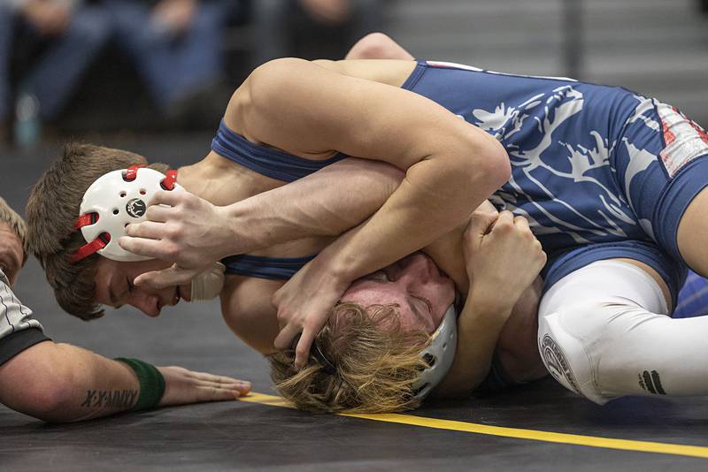 Newman’s Zhyler Hansen gets pinned by Morrison’s Eli Modglin in the 126 pound finals Saturday, Jan. 31, 2026, during the Class 1A Wrestling Regionals at Riverdale High School.