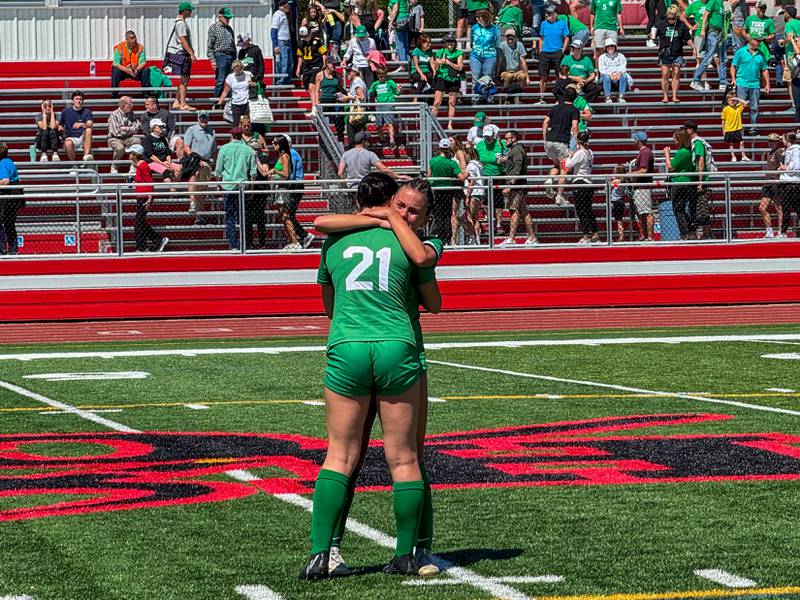 York’s Andriana Soupos (21) consoles Michaela Quinn (14) after a season sending loss to Lyons for the a Class 3A Hinsdale Central Sectional girls soccer championship at Hinsdale Central High School on Saturday, May 25, 2024.