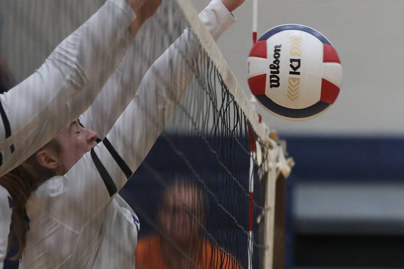 Nazareth’s Katherine Sandt blocks a shot against Joliet Catholic on Tuesday, October 11th in Joliet.
