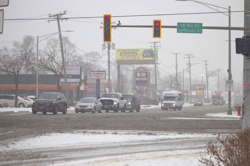 Vehicles at the intersection of Jefferson Street and Larkin Avenue in Joliet on Wednesday, Feb. 12, 2025.