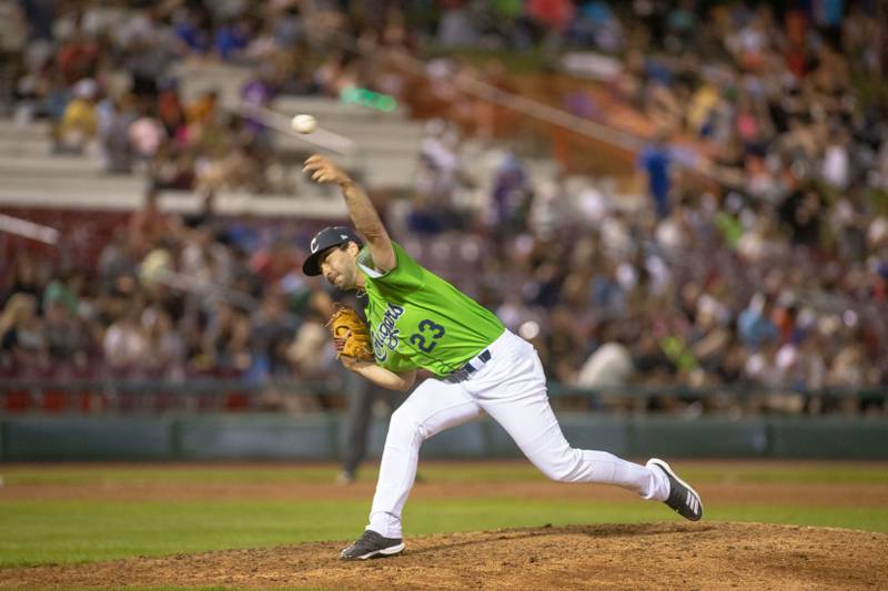Koby Bishop (23) pitches for the Kane County Cougars during a game against the Milwaukee Milkmen at Northwestern Medicine Field on Thursday, July 14, 2022.