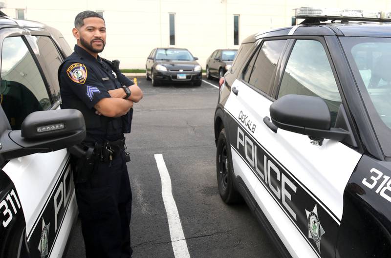 DeKalb Police Sgt. Raynaldo Hernandez prepares to start his shift Thursday, April 11, 2024, behind the DeKalb Police Department.